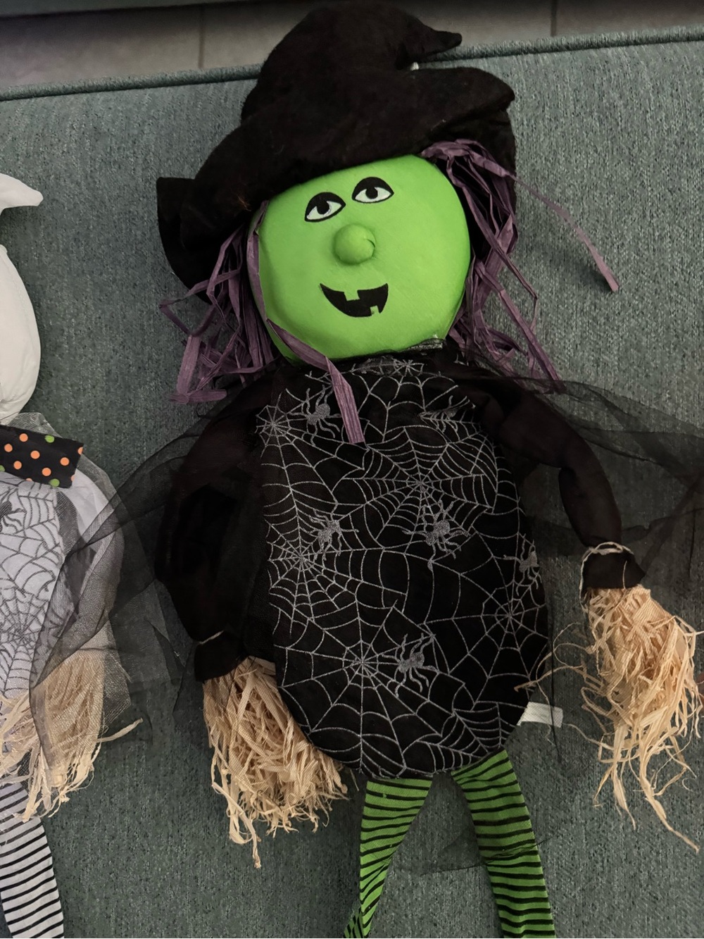 Green Witch hanging Holiday Décor with Black Spiderweb Dress